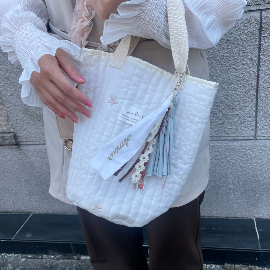 506_mela-B ヌビバッグ + チャーム (名入れ刺繍可)